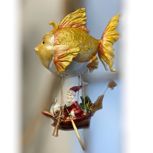 Julian i robåd med fisk