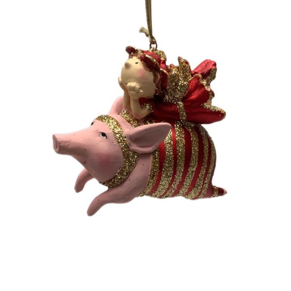 Julefigur, pige på gris